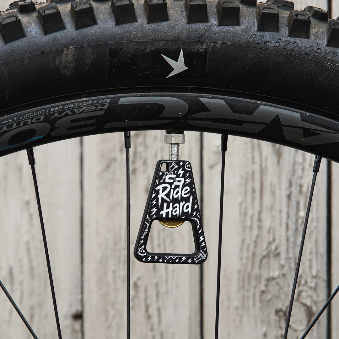 Valve-Mounted Bottle Opener Ride Hard