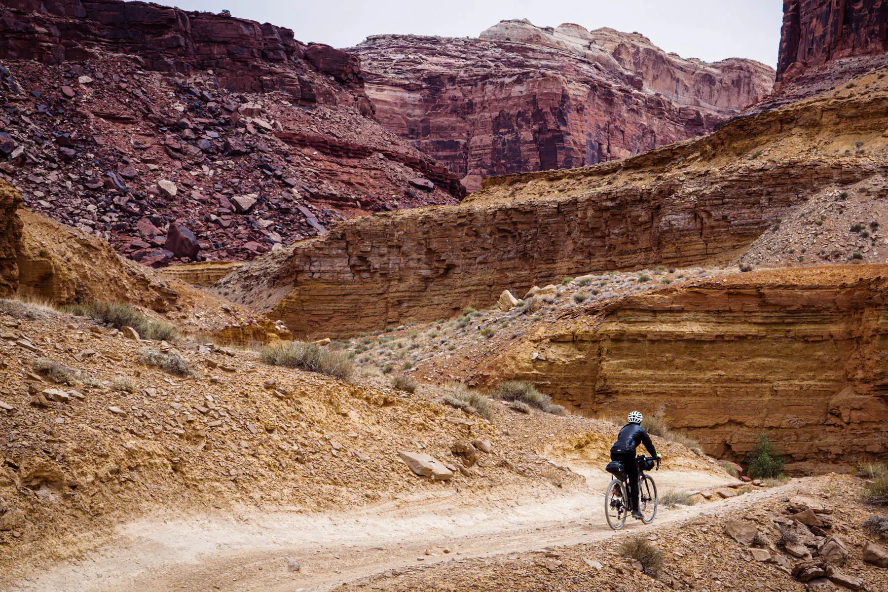 Gravel rider in a rocky landscape