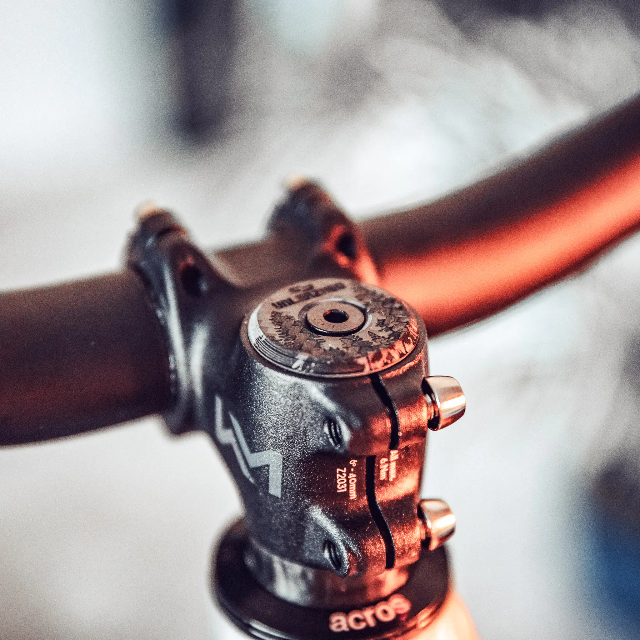 CF01 carbon top cap on a mountain bike with red handlebars